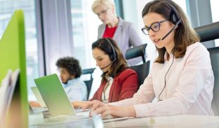 Call center manager observes agents