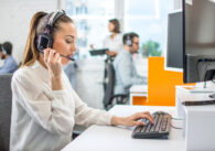 Beautiful,Female,Call,Center,Operator,Working,On,Computer,In,Office