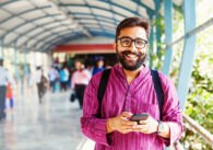 Bearded,Indian,Man,On,Metro,Station,Using,App,In,His